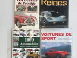 trois livres posés sur une table blanche, avec une voiture de sport rouge en arrière-plan