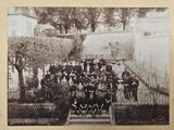 an old photo of a group of men in uniform