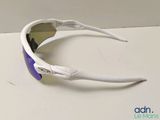 the glasses are white and have purple lenses on them