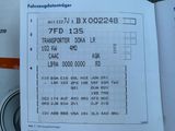 a picture of a receipt with a picture of a bus driver