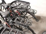 a lot of bikes that are parked next to each other