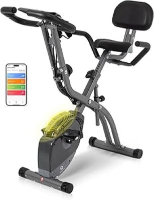 une photo d'un vélo d'appartement avec un téléphone portable à côté