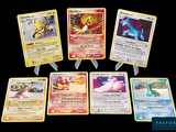 several pokemon cards are arranged in a circle on a black background
