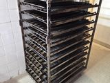 an image of a rack with trays of food in it