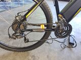 a close up of a bike that is parked in a garage