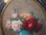 a picture of a painting of roses in a blue vase