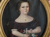 tableau représentant une femme en robe rouge tenant un bouquet de fleurs