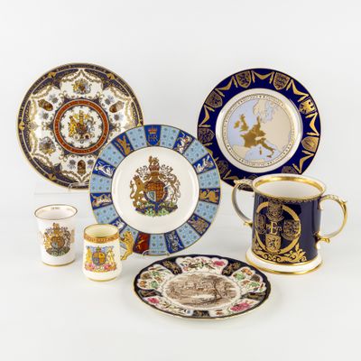 an image of a group of porcelain plates and cups on a white surface