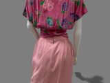 an image of a mannequin wearing a pink dress with flowers on it