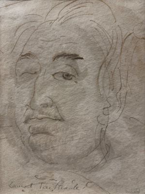 drawing of a man ' s face on a piece of paper