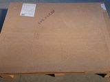 a large cardboard box sitting on top of a wooden pallet