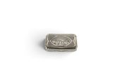 an image of a small silver box with a picture of a man on it