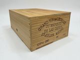 a wooden box that has a label on it