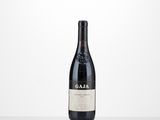 a bottle of wine sitting on a table with a white background