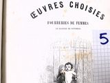 un vieux livre avec l'image d'un enfant tenant un chat dans ses bras