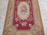 a rug with a picture of a woman on it