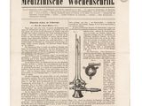 la une d'un journal allemand avec la photo d'un microscope