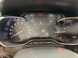 a close up of a car dashboard with a speedometer