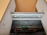a box with a computer inside of it that is open