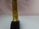 a measuring tape that is attached to a pair of shoes