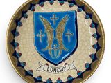 a picture of a blue and gold plate with a coat of arms on it