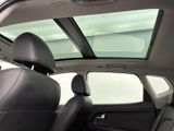 a view of the sunroof from inside of a car