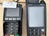 two cell phones sitting next to each other on a table
