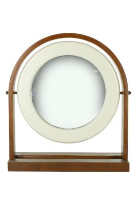 a wooden clock with a circular mirror on top of it