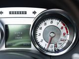 a close up of a car dashboard with a speedometer