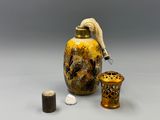 a yellow vase and a brown vase on a gray background