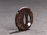 a close up of a small metal object on a table