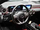 the interior of a car with a steering wheel, dashboard, and dash board