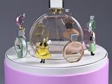 a bottle of perfume sitting on top of a pink box