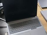 two laptops that are sitting on a table