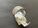 a ring that is sitting on top of a piece of paper