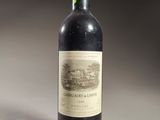 a bottle of wine that is sitting on a table