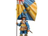 statue of a man holding a flag and standing on a wooden base