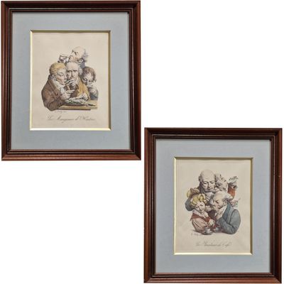 deux reproductions encadrées représentant un homme et une femme assis à une table