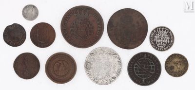 an image of a group of old coins on a white surface