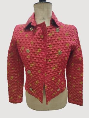 red and gold jacket on a mannequin mannequin mannequin mannequin mannequin mannequin mannequin mannequin manne