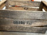 a wooden crate with a label on it sitting on the floor