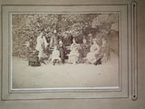 a black and white photo of a group of people posing for a picture