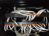a bunch of wires that are connected to a cabinet
