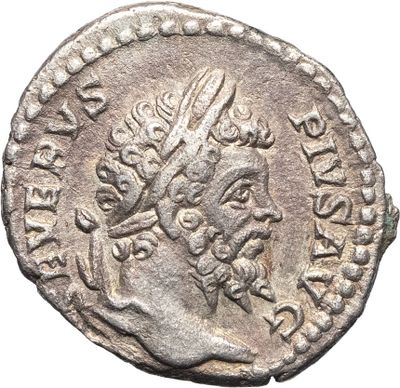 une pièce d'argent portant l'image d'un homme