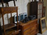 a room with a lot of furniture and a tv