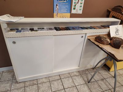 a picture of a counter with bread on top of it