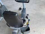 an image of a stationary exercise bike in a garage