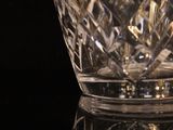 a glass vase that is sitting on a table