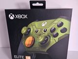 a close up of a box with a game controller inside of it