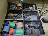 a box full of assorted items sitting on a table